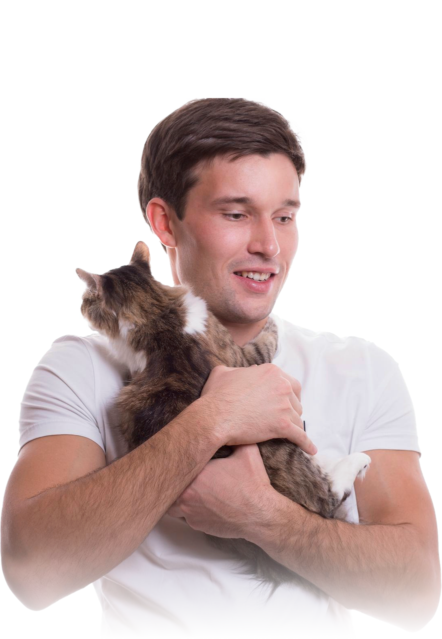 Boy in white t-shirt carrying his cat